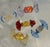 A beautiful set of 5 Italian Murano candy sculptures, in blue, gold, red, purple, yellow and orange. MAKER'S MARK: None...