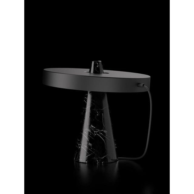 Table lamp with Marquinha black stone base and black paint lightshade. The light shade is disconnected from the stone base...