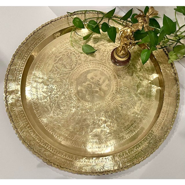 This is for a large solid Brass vintage hand crafted round tray. This measures: 28.5 inches in diameter x 1.5 inches. The...