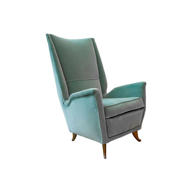 A pair of armchairs designed by gio ponti and produced by isa of bergamo in the 1950s. The armchairs have been completely...