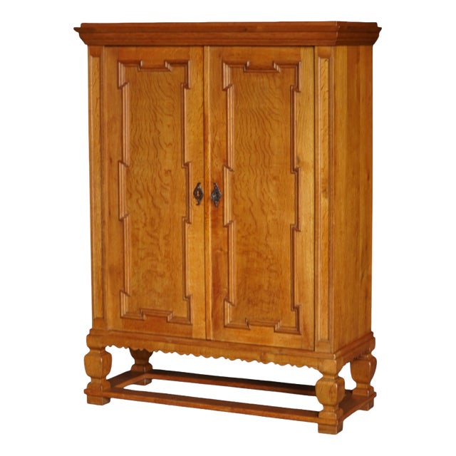 Mid-Century Modern Danish Oak Cabinet with Carved Doors and Decorative Base, 1950s For Sale