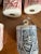 Set of nine pale blue and pink vintage handmade in the USA, porcelain drum shaped Christmas tree ornaments.