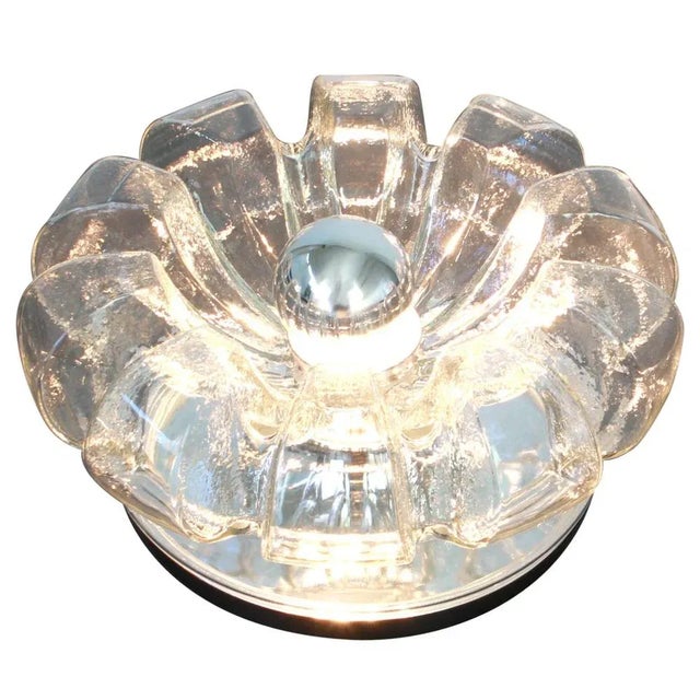 A special round biomorphic clear glass wall sconce or flush mount designed by koch & lowy for peill & putzler,...