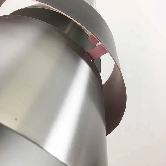 Pendant light by Jo Hammerborg, 1963. Producer Fog and Mørup, Denmark. This metal hanging light was designed by Jo...