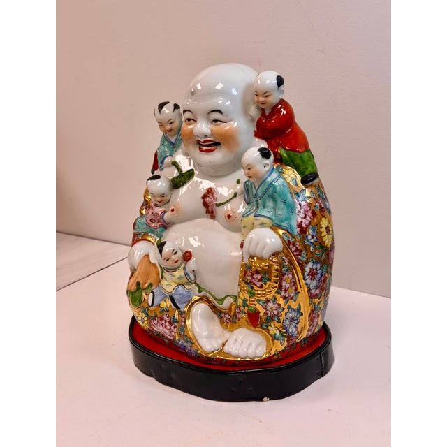 Vintage hand painted ceramic laughing buddha from China, symbolizing family harmony, fertility, and good fortune. The five...