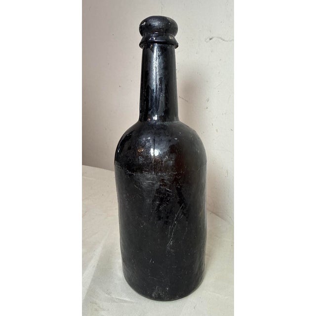 Up for sale is a rare antique 18th century handmade whiskey glass bottle. It is mold blown out of 4 pieces and has a nice...