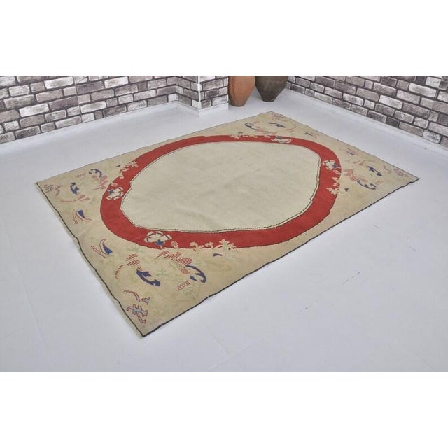 Textile Vintage Turkish Oushak Area Rug With Bold Red Oval Medallion and Cream Field For Sale - Image 7 of 10