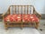 Bring a vibrant splash of vintage island style into your home with this striking mid-century modern rattan 2-seater sofa...