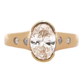 1.70 Carat J/I1 Oval Diamond and Floating Diamond Shank Engagement Ring, Size 7.25 For Sale
