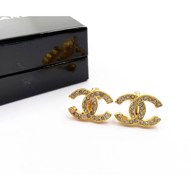 Chanel Vintage Gold Plated CC Crystal Clip on Earrings *Marked Chanel *Marked 2084 ( During 70s) *Comes with the original...