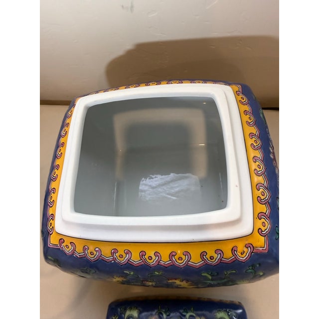 Enhance your home decor with this exquisite decorative bright blues ceramic box-container. Featuring a vibrant floral...