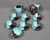 VALLAURIS Coffee set in black and turquoise blue faience, comprising a covered coffee pot, a milk jug, six cups with...