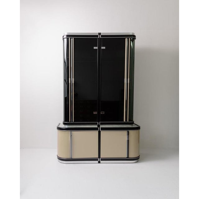 This exceptional vintage Art Deco design bar cabinet from the 1950s is a true statement piece, handcrafted in Italy with...