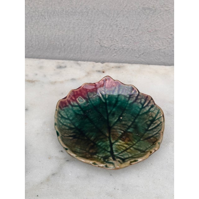 English Majolica butter pat with leaf, circa 1890.