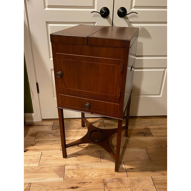 Period Georgian Flame Mahogany Diminutive Cupboard with satin wood string inlay. It’s Small Size Lends it to work well as...