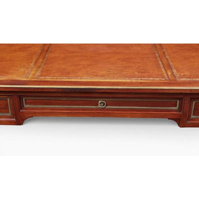 The 19th c. French Louis XVI Mahogany Bureau Plat is a stylish and elegant piece of furniture. This bureau plat, or desk,...