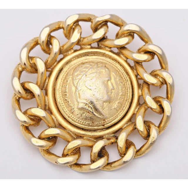 This is part of Chairish’s Costume Jewelry assortment. Large Napoleon coin edged in large chain has hook to be a pendant...
