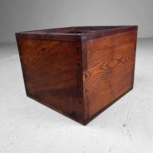 Solid wood hibachi with a copper lining. Expertly finished with wooden joints. Over a century old and in very good...