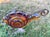 Carnival Glass Garden Snail with Copper Wire wrap. Vintage Heavy Amber iridescent glass. Comes with original attached...