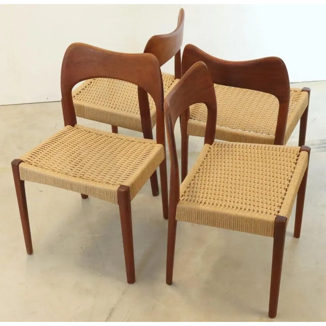 Beautifully designed set of 4 designer chairs designed by top designer Arne Hovmand Olsen for the Mogens Kold factory from...