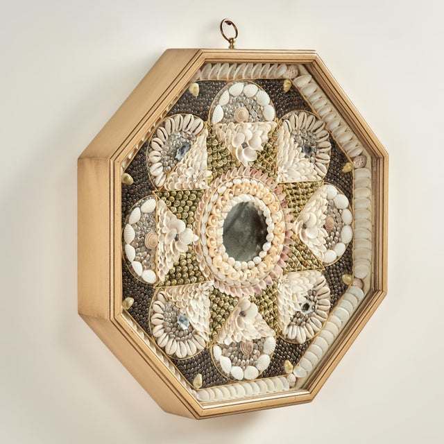 Charming vintage sailors valentine handcrafted with exotic organic seashells ambitiously arranged around a distressed...