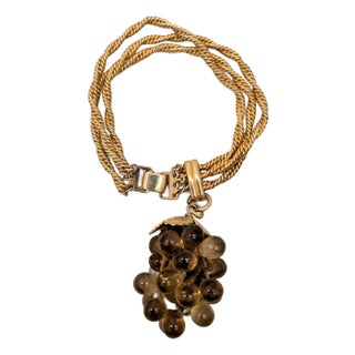 Vintage 1960s Signed Napier Goldtone Faux-Topaz Grape Cluster Charm Bracelet For Sale