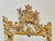 A beautiful carved mirror in the louis xv style. This masterpiece is made of solid wood and richly decorated with hand...