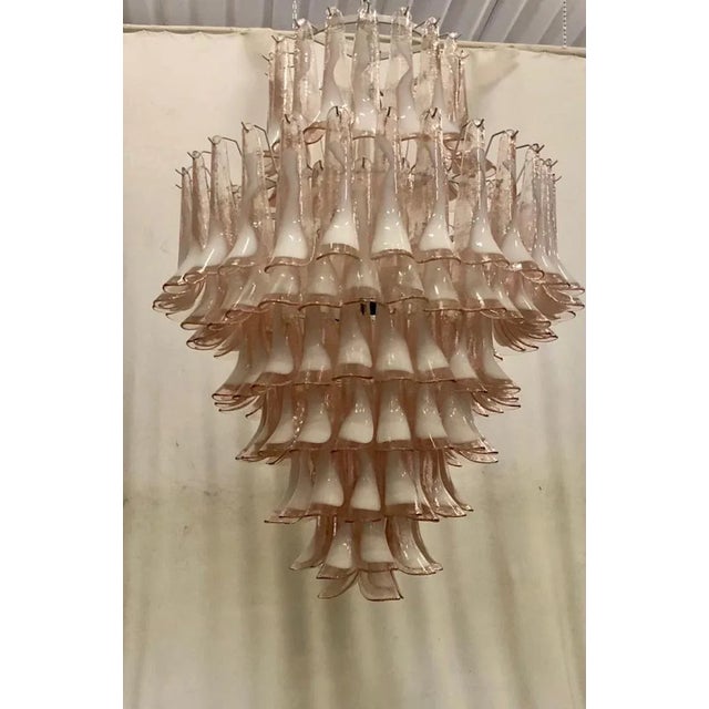 Extraordinary light pink and white color for this "Mazzega" Murano chandelier, a light pink and white color with a unique...