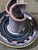 Signed Bay Pottery sculptural ceramic candlestick holder featuring a striking reactive glaze in shades of purple, blue,...