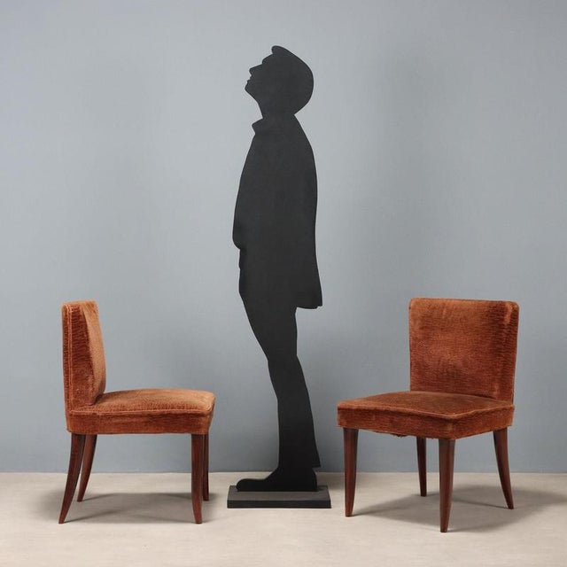 Set of 6 chairs, sprung padding with velvet upholstery, legs in stained beech wood. This piece is attributed to the...