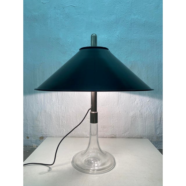 One 1970s table lamp, two-bulb, e27 socket. Designed by ingo maurer for design m, model ml3. metal and glass base,...