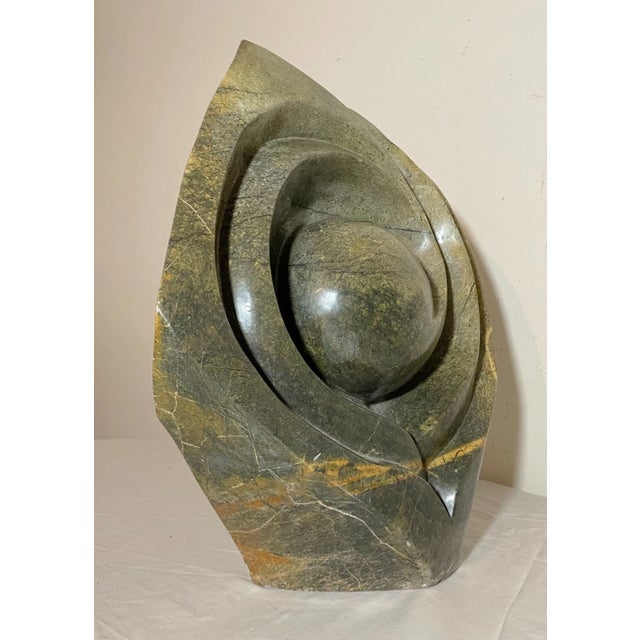 Up for sale is a wonderfully large antique hand carved green marble sculpture done in a modernist style. It's completely...