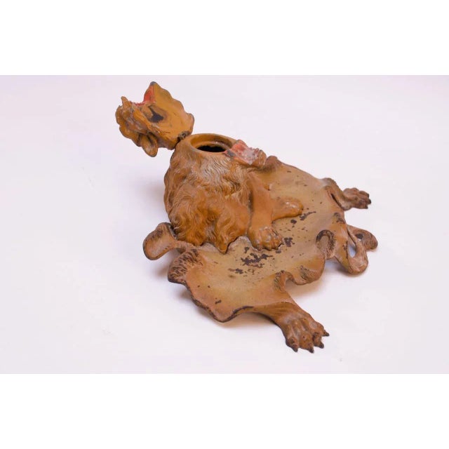 Figural lion inkwell boasting original paint with hinged lion's head concealing the well, circa late 1800s Patina / paint...