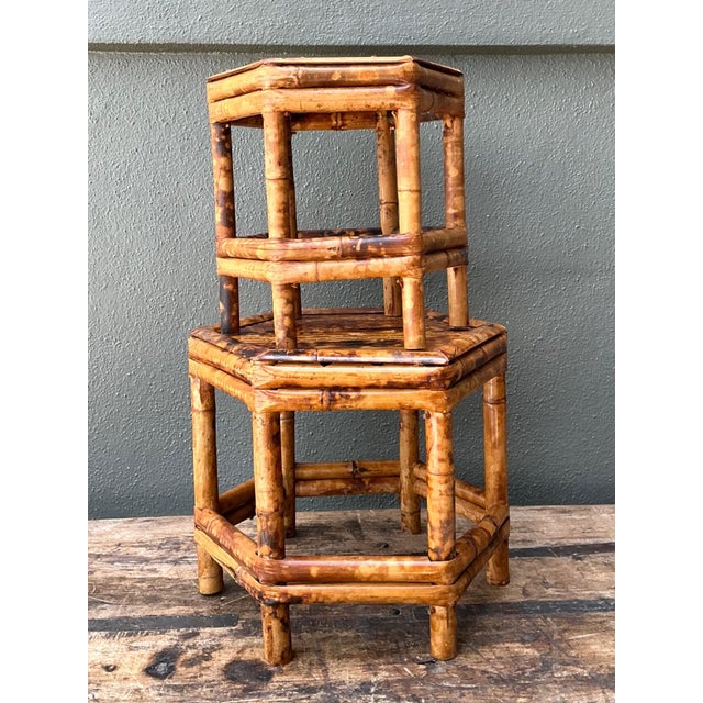 Crafted with exceptional mid-century craftsmanship, this pair of vintage hexagonal pedestals beautifully showcases the...