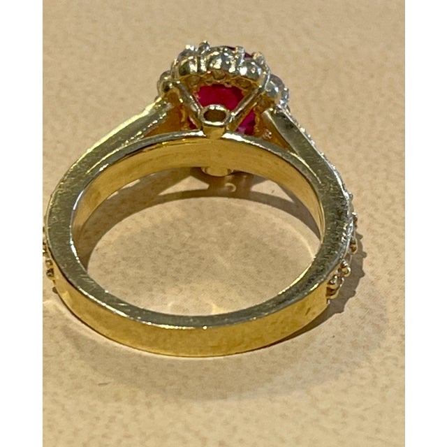 Oval 1.5 Carat Treated Ruby and 1.20 Carat Diamond 14 Karat Yellow Gold Ring For Sale - Image 12 of 18