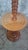 A louis xiii style turned and carved wooden floor lamp, incorporating a round shelf at mid-height. The stem is decorated...