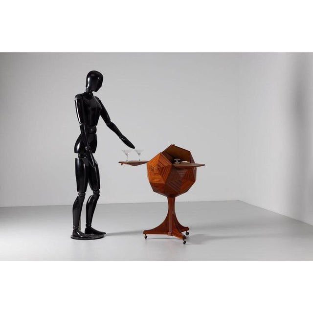 This exceptional dry bar is a rare and highly sculptural piece that speaks to the refined experimentation of French design...