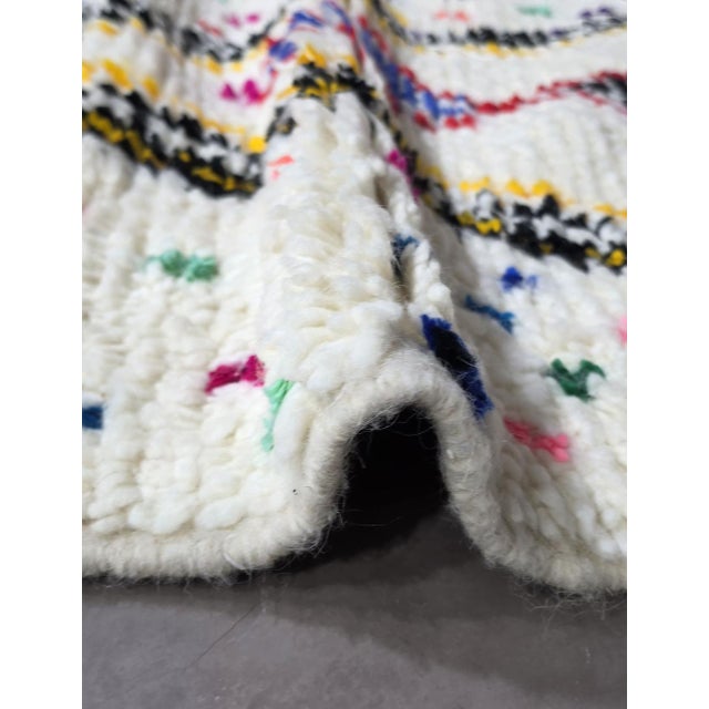 Handmade Azilal Rug – Contemporary Moroccan Berber Wool Carpet This handmade Azilal rug combines traditional Berber...