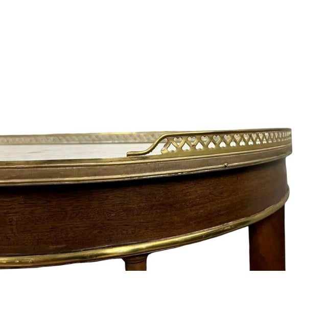 Parisian half-moon shaped Louis XVI style mahogany console table, circa 1850 Topped with a beautiful white Carrara marble...