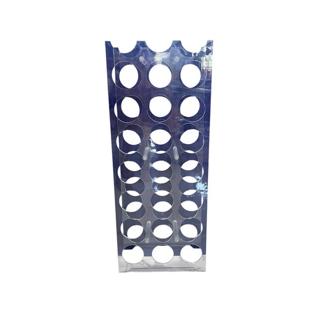 The Vintage Modular Lucite Floor Wine Rack is a stylish and functional addition to any home bar or kitchen. With a tower...
