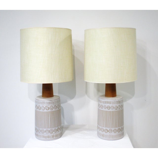 A pair of very well -crafted pottery table lamps by Jane and Gordon Martz whose pieces defined the Mid -Century period....