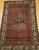 "This antique Persian Malayer rug, handwoven in the early 1900s, is a remarkable example of fine craftsmanship from the...