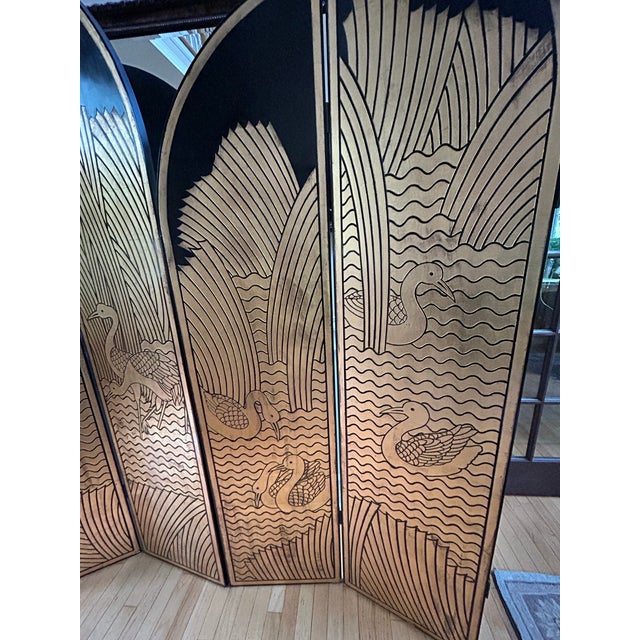 An exceptional and dramatic Hollywood Regency / Art Deco revival folding screen room divider, famously recognized as the...