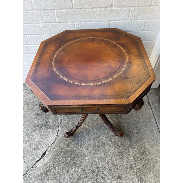 Burgundy Antique English Regency-Style Drum Table Is Constructed From Mahogany Wood and Features an Octagonal Leather Top With Gold Tooling For Sale - Image 8 of 10