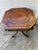 Burgundy Antique English Regency-Style Drum Table Is Constructed From Mahogany Wood and Features an Octagonal Leather Top With Gold Tooling For Sale - Image 8 of 10