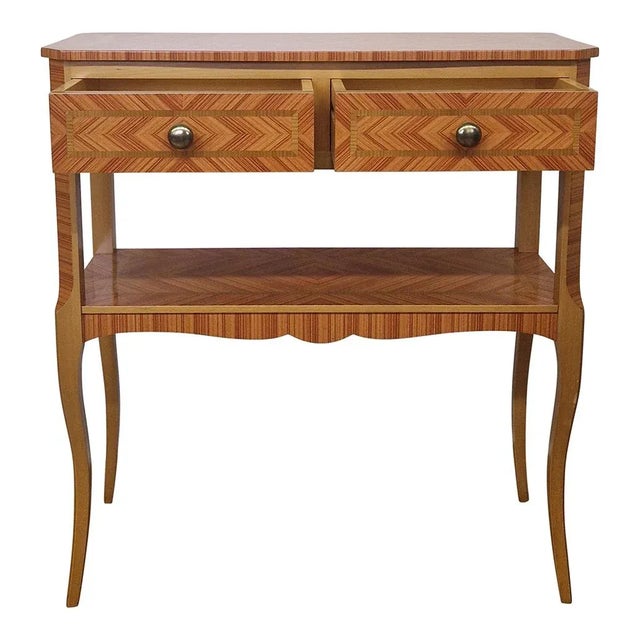 Elegant console with two in-line drawers and an open shelf, in wood with geometric inlays in different essences....