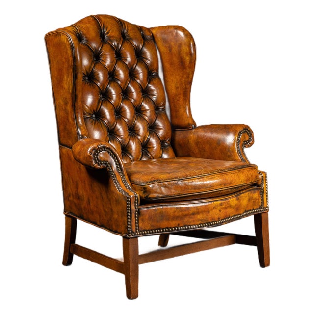Mid 20th Century Tufted Leather Wingback Armchair in Amber For Sale