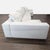 This Flexform sectional sofa offers a spacious and modern seating option in a light ivory fabric. Features deep cushions,...