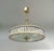 Italian art deco style drum chandelier with clear Murano glass rods mounted on solid brass frame in unlacquered natural...