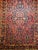 "This elegant hand-knotted Persian Sarouk rug from the first quarter of the 20th century showcases the classic allover...